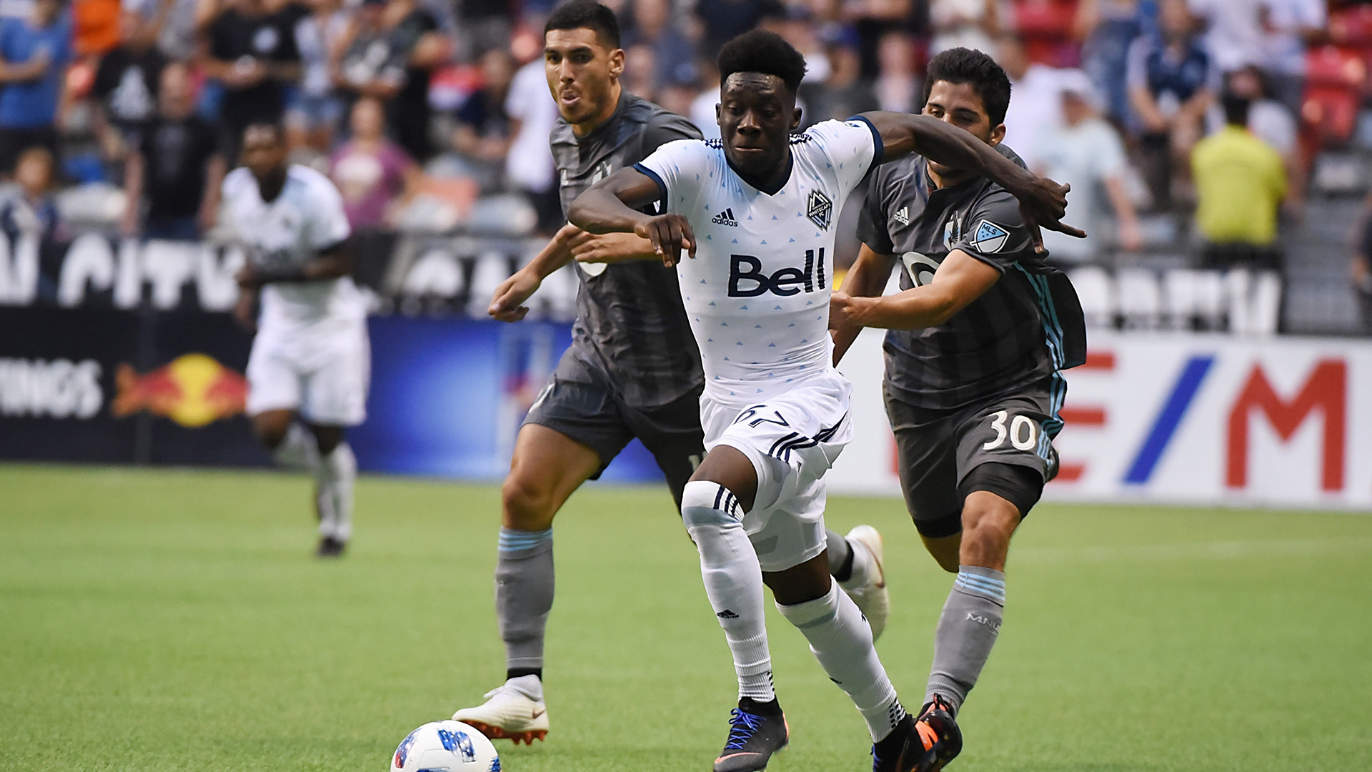 Alphonso Davies in action against Minnesota United during the 2018 MLS seas...