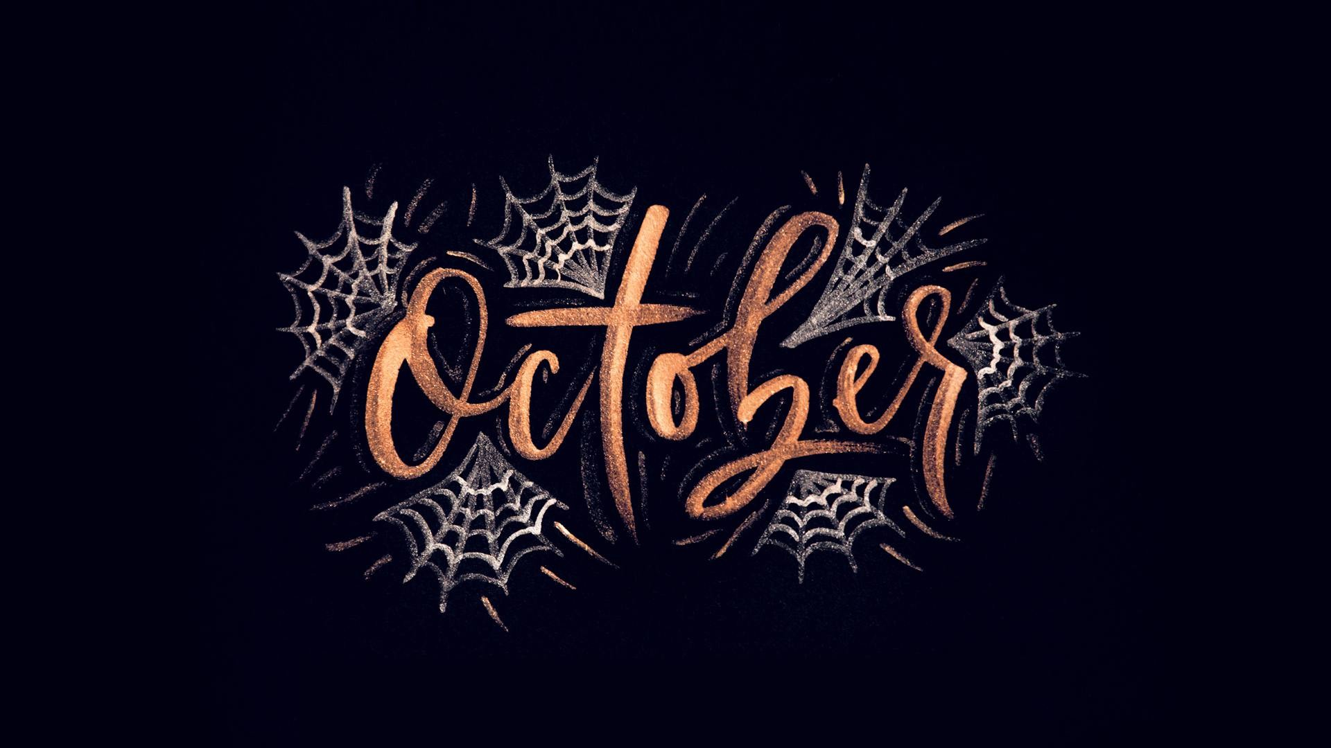 A black background with "October" and spider webs 1920x1080
