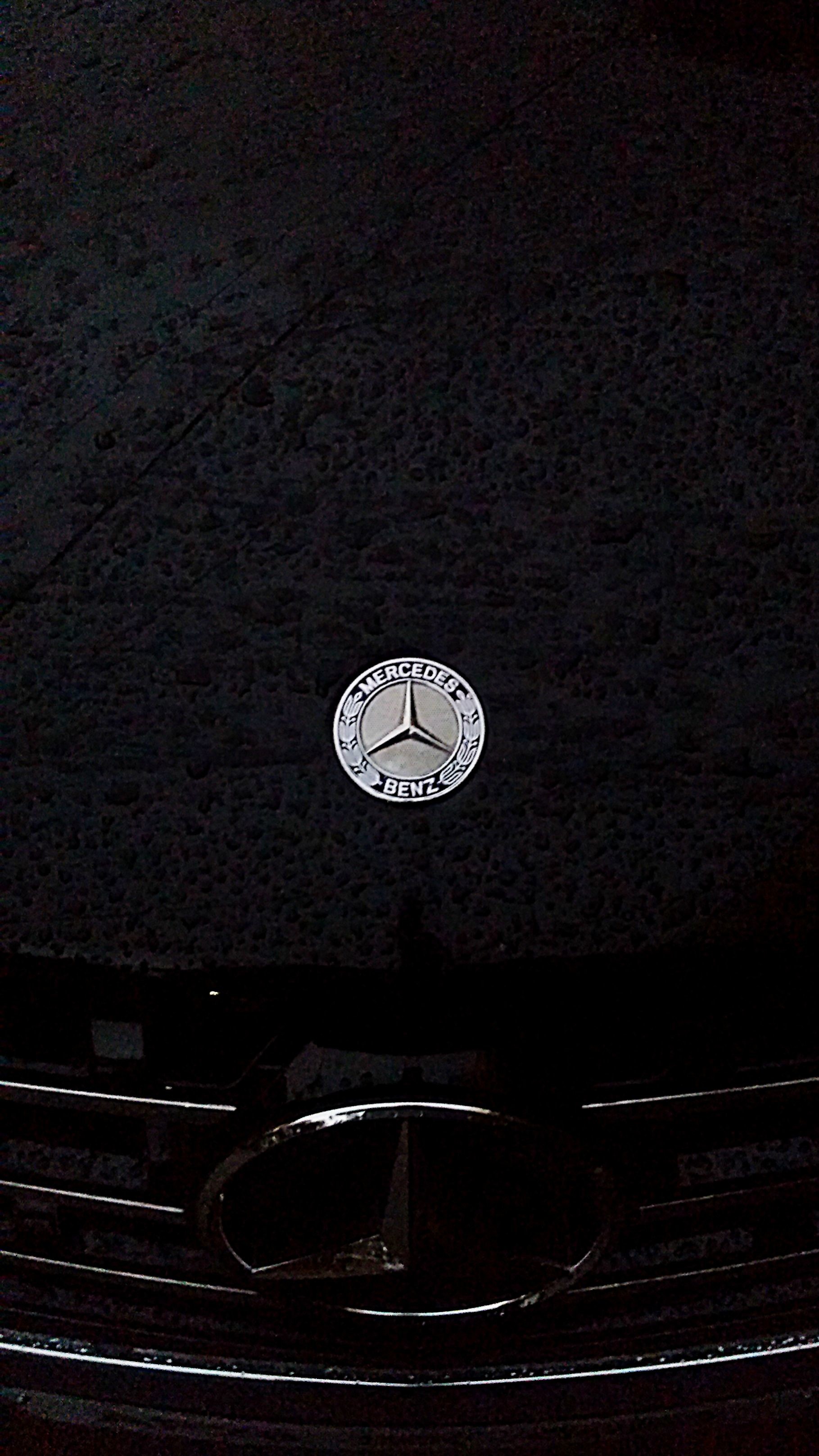 Premium AI Image | a mercedes logo is shown with a black background.